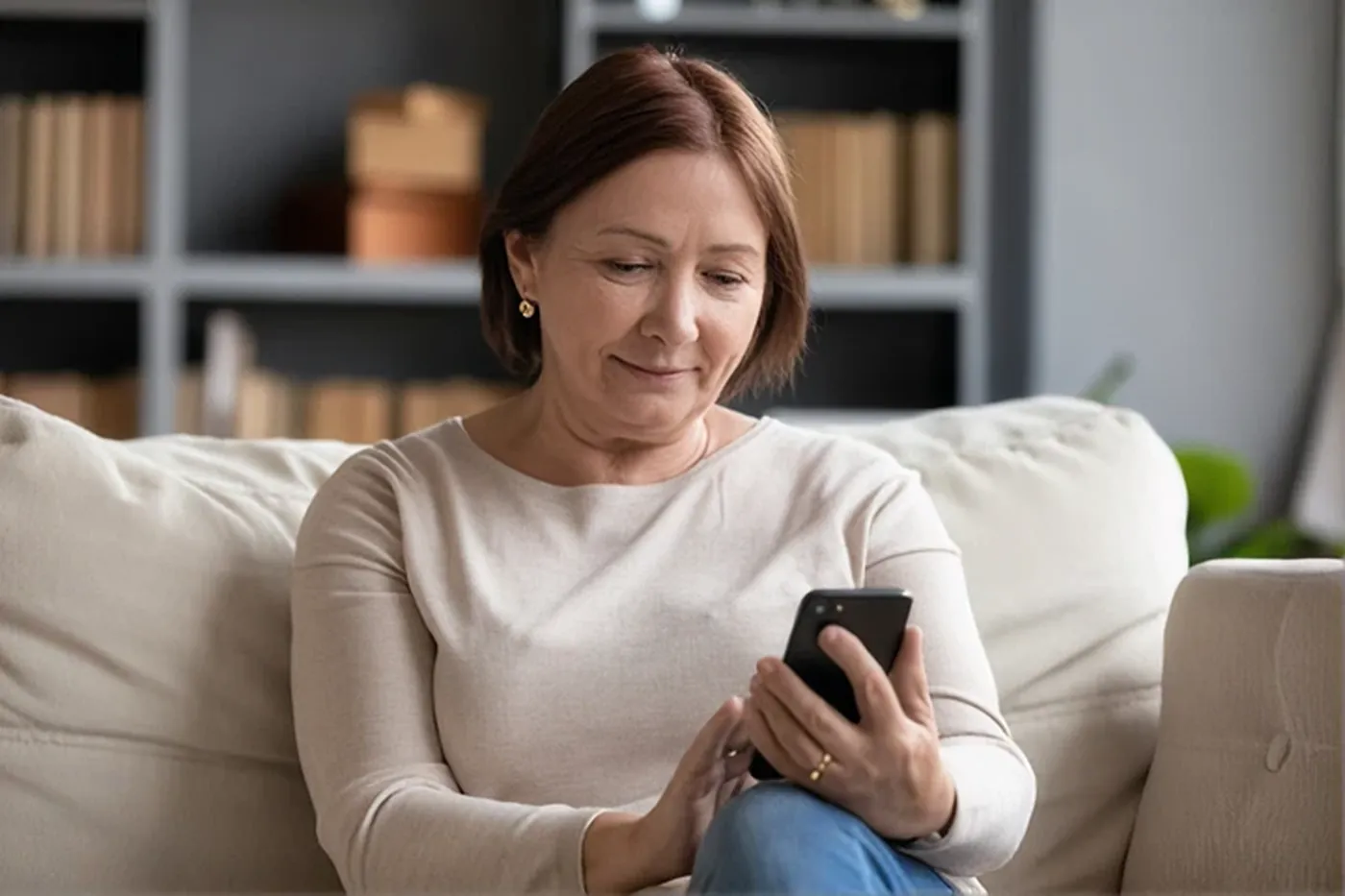 A bariatric patient checking her recovery plan at home
